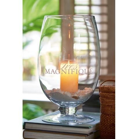 Tres Magnifique Hurricane L A playful hurricane vase with a domed shape and the lettering Tes Magnifique. Also available in