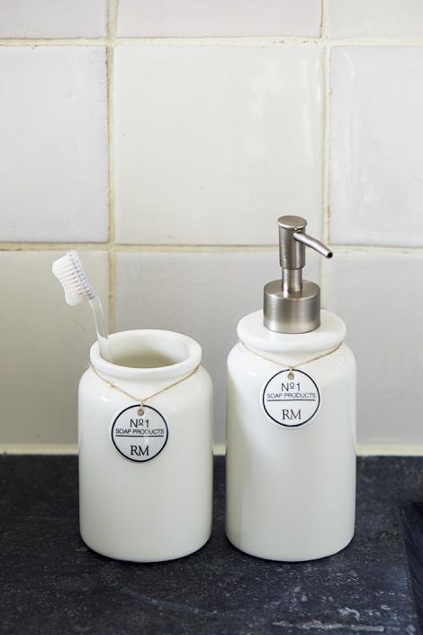 No.1 Soap Products Bathroom Set Wash your hands and brush your teeth. This porcelain bathroom set includes a refillable soap